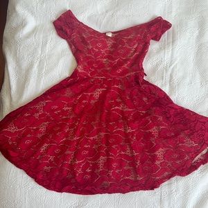 Red lacy dress with nude slip